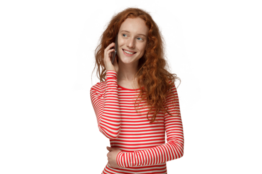 Young redhead curly woman talking on the phone