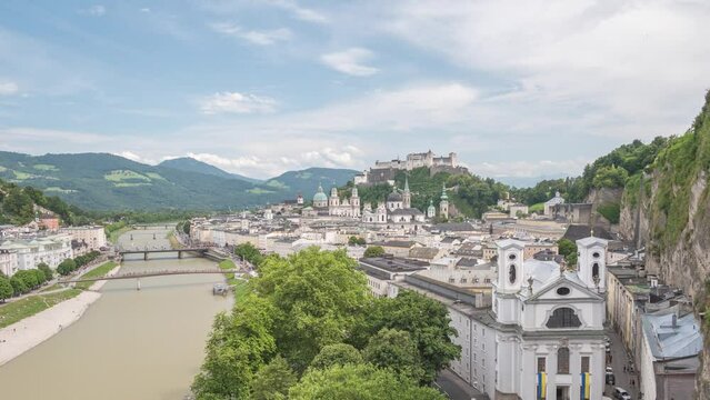 Salzburg Austria time lapse 4K, city skyline timelapse at Salzace River and Fortress Hohensalzburg