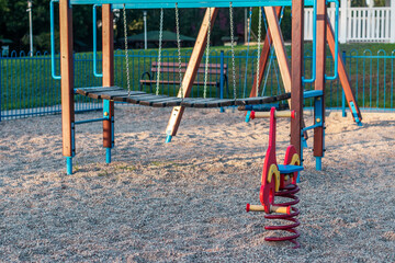 Local children's playground by the setting sun.