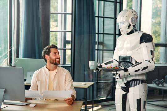 Robot and man at home