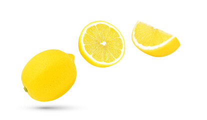 Whole, half and slice fresh lemon fruit falling in the air isolated on white background.