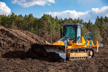 Bulldozer (crawler dozer) at work in the field.