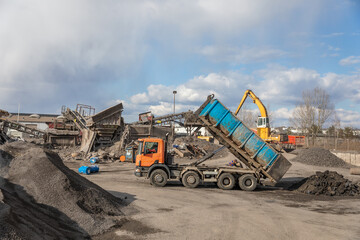 A company producing road aggregate. Production line.