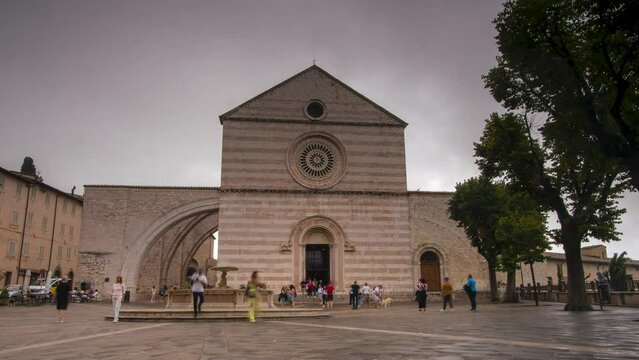 Assisi, Italy time lapse of the papal basilica church of Saint Clare founder of the Poor Clares one of the most famous pilgrimage destinations of Christianity. City of peace