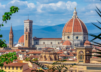 Santa Maria del Fiore cathedral (Duomo) over city center, Florence, Italy (inscription 