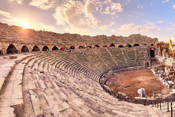 Ancient theatre ruins in Side, Turkey at Sunset. Popular tourist destination in Turkey.