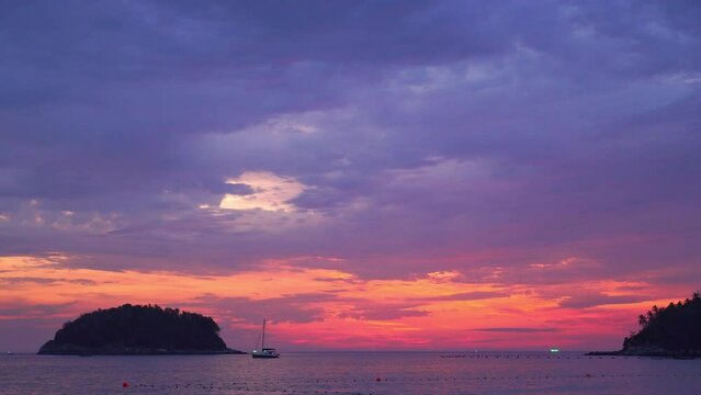 Scene of romantic sky with bright pink cloud cover the ocean at sunset..beautiful purple sky at sunset in nature and travel concept..sunset landscape Amazing light of nature cloudscape sky background.