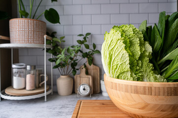 green vegetable on the kitchen table to for health eating and consuming veggie , vegan food.