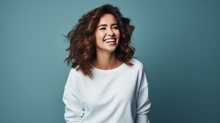 Obraz premium happiness of an optimistic young girl in casual clothes, her genuine smile radiating confidence and positivity.