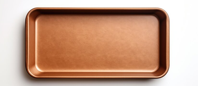White background brown parchment paper baking sheet empty oven tray rectangular baking pan nonstick utensils top view
