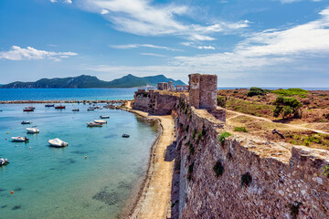 Seaside landscape with panoramic view of Methoni Castle a medieval fortification in the port town of Methoni, Messinia Peloponnese, Greece