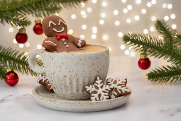 Obraz na płótnie Canvas Gingerbread cookie man in a hot chocolate.