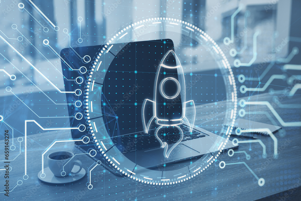 Aufkleber close up of laptop and coffee cup on desk with creative digital circular rocket hologram with circui