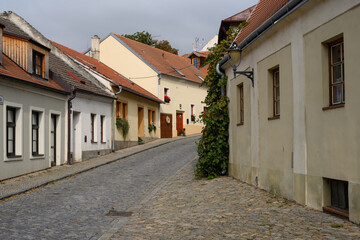 Fototapeta na wymiar Velka Frantiskanska Cobblestone Street in the Old Town of Znojmo, Moravia, Czech Republic