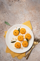pumpkin shaped gnocchi with brown butter parmesan sauce