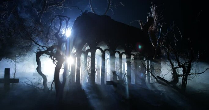 Silhouette of person standing in the dark forest with light. Horror halloween concept. strange silhouette in a dark spooky village
