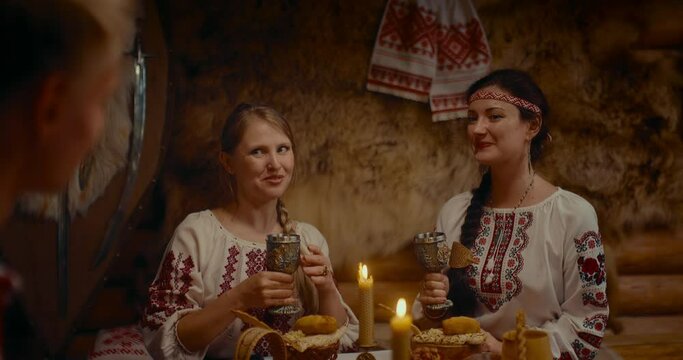 matchmaker and fiancee in dinner in old Slavic village, historical reenactment, portrait, 4K, Prores