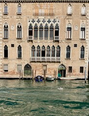 Fototapeta na wymiar Venice, Italy: old palazzo alongside Gran Canal