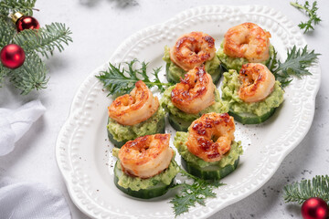 Shrimps, cucumber and avocado guacamole, party food, finger food
