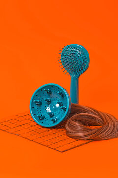 Hair dryer and brush near extensions
