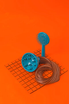Hair dryer with extensions near hair brush
