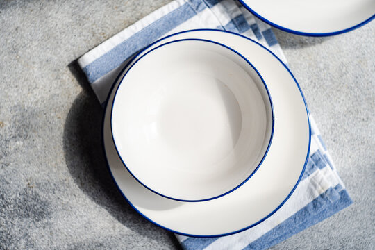 Minimalistic rustic table setting on gray surface