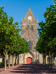 Church with parachute memorial Sainte-Mère-Église, Normandy