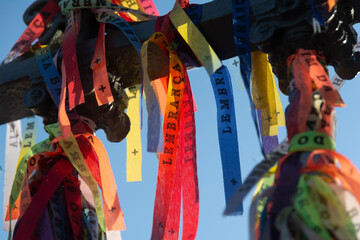 Close-up photo of souvenir ribbons tied to an iron railing in Largo Terreiro de Jesus, Pelourinho,...