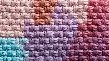 Colorful knitted pattern as background. Textile texture. Close-up of colorful textile pattern. Multicolored Yarn texture for background, wallpaper, wrapping paper, web page backdrop, winter design.