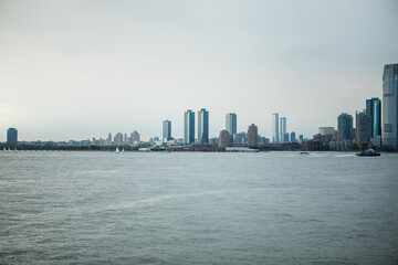 New York,  New York state  USA - August, 30, 2023 - Staten island ferry on the hudson river in lower manhattan in New York city on a sunny day, United States.
