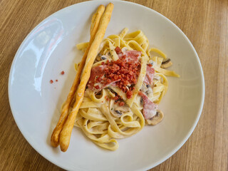 Creamy beef classic fettuccine.  carbonara pasta.  spaghetti carbonara