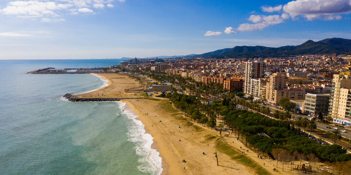 Scenic view from drone of large coastal Spanish town of Mataro on sunny winter day, Catalonia