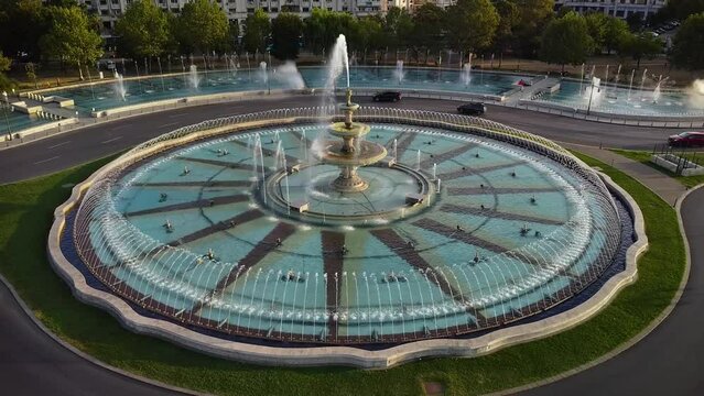 High angle drone footage of the Bucharest fountains at Piata Unirii. Union square seen from above in 4k. Beautiful summer cityscape aerial shot. 
