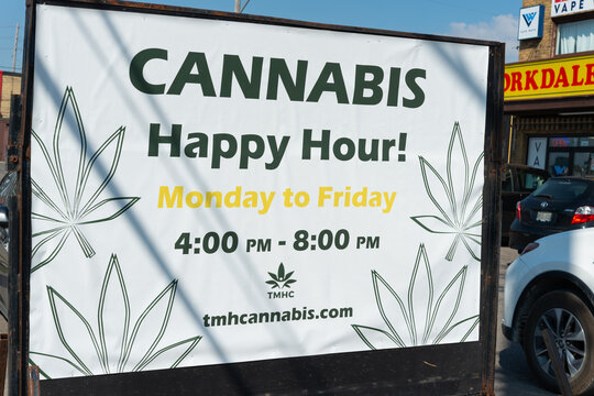 mobile tarp sign for Take Me Home Cannabis (TMH Cannabis) located in the parking area outside store located at 3257 Dufferin Street, Toronto, Ontario