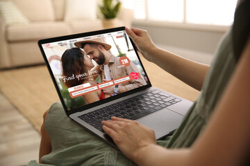 Looking for partner. Woman using laptop at home, closeup. Dating site webpage on device screen