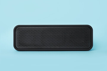 One portable bluetooth speaker on light blue background. Audio equipment