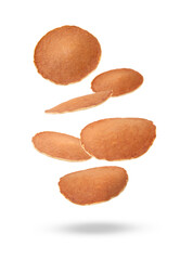 Many tasty fresh pancakes falling on white background