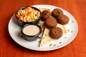 Falafel and pita bread on a plate