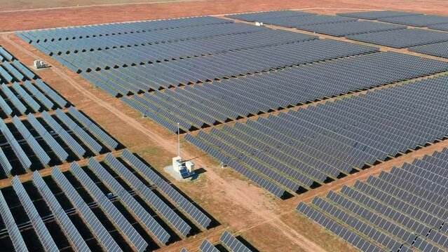 Solar Farm in a Desert Generating Renewable Energy, Aerial View