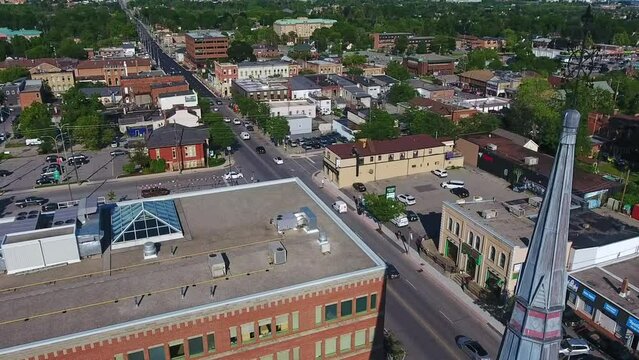 All Saints Spire with Background Traffic Along Dundas Street from an Aerial Drone Shot Above the Town of Whitby in Ontario, Canada.