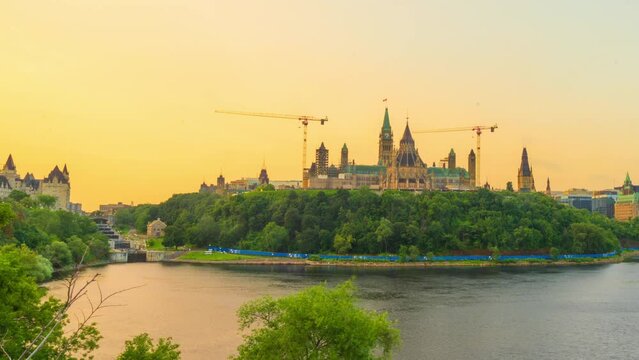 4k time-lapse over Parliament Hill to the Library of Parliament in golden hour. Ottawa, Ontario, Canada