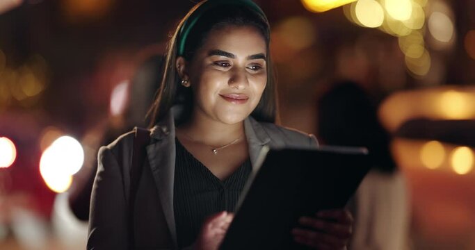 Happy, night and a woman with a tablet in the city for social media, communication or funny chat. Laughing, dark and a young girl typing on technology for conversation on an app or contact online