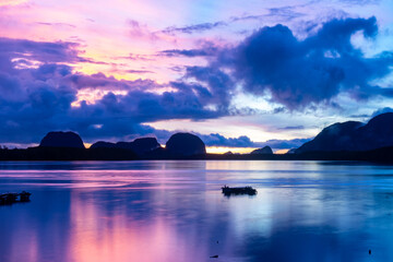 Landscape colorful clouds in the sky sunset or sunrise over sea with reflection in the tropical sea,Beautiful landscape scenery,Amazing light of nature, Landscape nature background