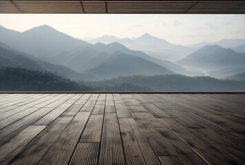 Wooden flooring in the afternoon fog with a mountain view.
