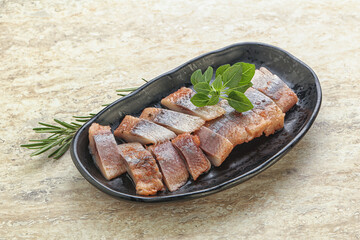 Delicous sliced herring fillet in grape sauce