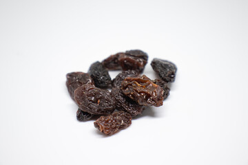 dried raisins on isolated background