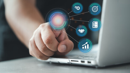 Businessman touching point of virtual to target in business. icons internet connection application digital network marketing online communication. Information and targeting.