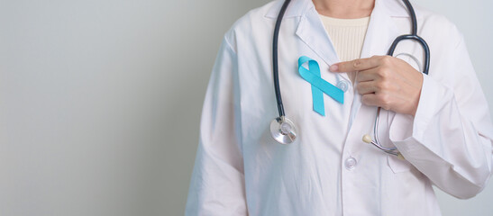 Blue November Prostate Cancer Awareness month, Doctor with Blue Ribbon in hospital for support...