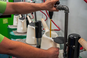 Close up view of a Maintenance Car service - auto oil change, motor check, brake cleaning, tire check, engine inspection, motor oil-brake inspection