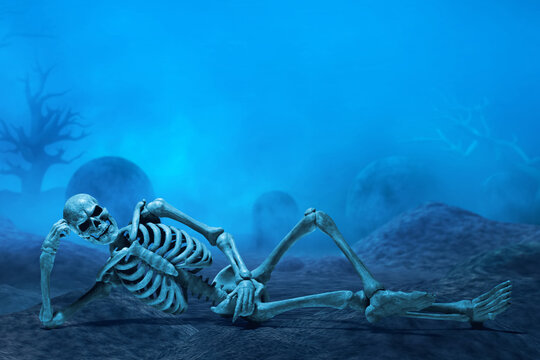 Funny human skeleton relaxing sleeping on graveyard cemetery with fog or smoke background